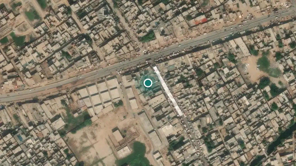 Satellite view of Bucheki centred on Standard Clinical Lab, with the covered Main Bazaar running through the middle and the main road along the top.